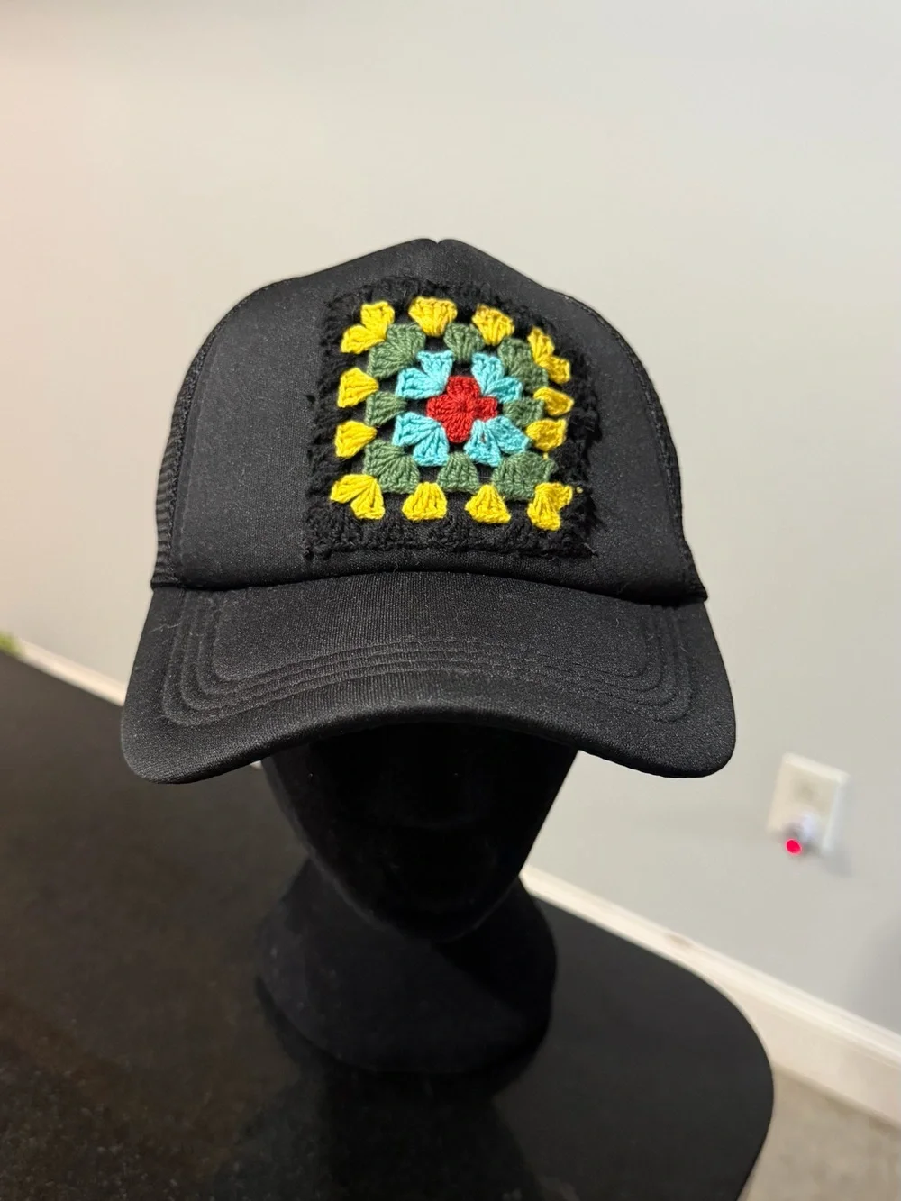 Black Truckers Hat with Crochet Granny Square.